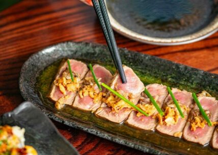 Wagyu tataki - 6 pieces of slightly seared wagyu served with truffle pozu, shallots & crispy onion Wagyu tataki - 6 pieces of slightly seared wagyu served with truffle ponzu, shallots & crispy onion