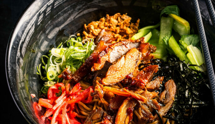 roasted duck mazudon with teriyaki sauce. udon noodles, spring onion, nori, crispy onion, benishoga & bonito flakes*, tossed in a rich soy based sauce