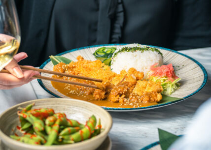 katsu curry panko fried and served with steamed rice, asian slaw, japanese pickles and our delicious sweet & savoury katsu curry sauce