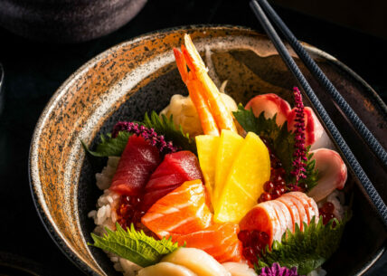 CHIRASHIZUSHI CHIRASHIZUSHI - sushi rice topped with a selection of sashimi and garnishes. a colourful “scattered sushi” dish bursting with flavour